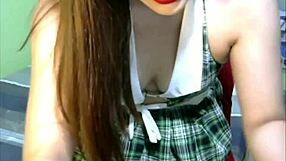 Asian girl engages in chatsex on webcam with teasing questions