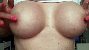 Busty milf orgasms from playing pierced nipples without bra