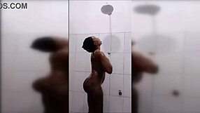 Huge Titted Black Cutie Showers Sensually.