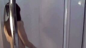 Japanese babe with small tits masturbates in bath POV