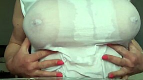 Busty milf orgasms from playing pierced nipples without bra