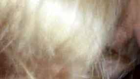 She sucks the big black cock to swallow that nut.