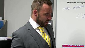 Muscular British Bodybuilder Bear Dominates In The Office With Intense Facial.