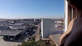 Naked woman exposes herself in hotel window!