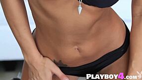 petite milf undresses slowly, showing tattooed boobs in striptease photo session