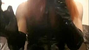 T-girl dressed in pvc enjoys two cigarettes at once