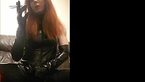 T-girl dressed in pvc enjoys two cigarettes at once