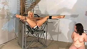 In training camp, the chubby submissive licks master's pussy while bound with buttplug and receives spanking instructions