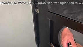 Oral gloryhole action at the bar with condom burst