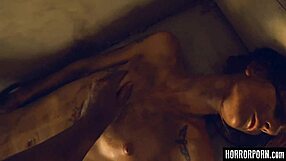 Beast licks bound woman outdoors.