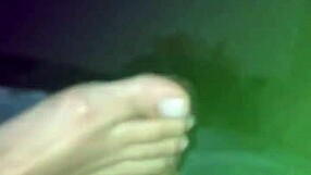 beautiful wife with cute feet gives an amazing footjob to her husband