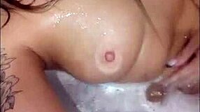 Pretty woman masturbates in hot tub for bright loud cumshot