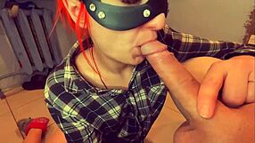 watch this redhead take a CUMSHOT in her throat