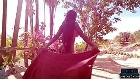 Ebony milf Shasta Wonder strips outdoors showing huge natural tits