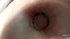 asian women share saliva in fetish scene