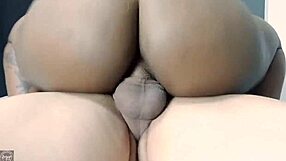 A white boy getting rough in action with a black adult film star, getting her drenched in sperm