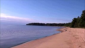 blonde babe masturbates on beach