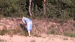 blonde babe masturbates on beach