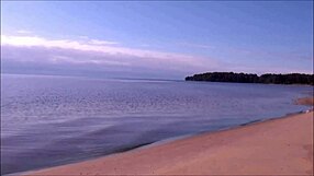 blonde babe masturbates on beach