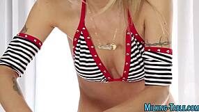 The sex therapist receives jizz in her mouth during a gloryhole massage session.