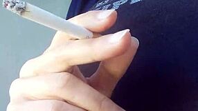 Smoking Fetish: Blonde Model Nudes Sexy Tits In Erotic Pose.