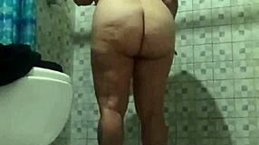 Hidden Camera Spies Mature Stepmother In Shower