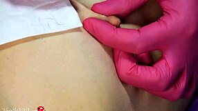 i can't believe this beautician is plucking my nipples in red latex gloves