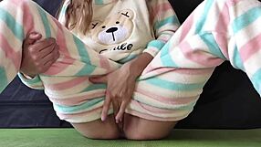 Look at this teen in pajamas masturbating hard and squirting!