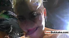 the short-haired beauty faces a group of huge cocks in an intense blowbang session