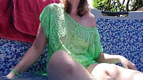 Blonde Latina Uses Toys Outdoors In Pool