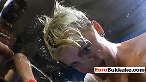 the short-haired beauty faces a group of huge cocks in an intense blowbang session