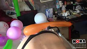 nora's suggestive balloon play with blowjob hints