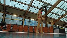 Hey, check out Katy Soroka in red swimwear by the pool