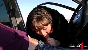 She gives a sloppy blowjob and swallows cum in the car during a public outing