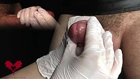 Intriguing medical exam extracting sperm from urethra in close up.