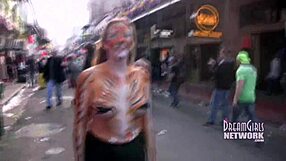 Bourbon Street flashes heat up the afternoon with daring public tit displays. Crowds can’t look away!