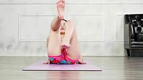 Korean girl practices yoga in bedroom