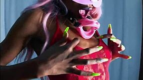 Alluring ebony slut teases with monster buttplug in tight pussy