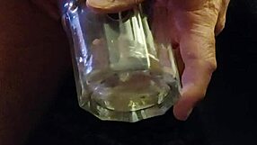 Drunk guy pissing and sipping it in a twisted game.