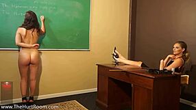 Mona Wales teases in British classroom with lesbian spanking and foot play