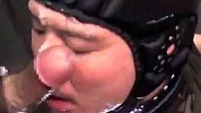 In the gloryhole, Asian gay men engage in a blowbang bukkake sucking frenzy