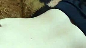 Young babe teases older man in the garage while on the phone.