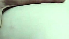 Young babe teases older man in the garage while on the phone.