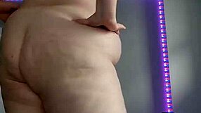 teasing with slow seductive dance moves in close-up