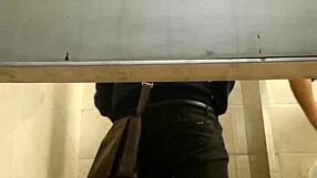 Two guys engage in intense gay action inside public toilet