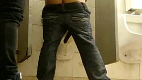 Two guys engage in intense gay action inside public toilet