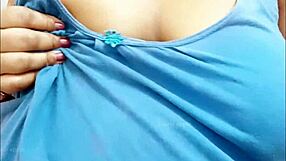 Big boobs Asian sexy MILF tempts viewers.