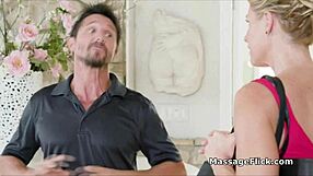 Oily masseuse provides relaxing massage to client in shower.