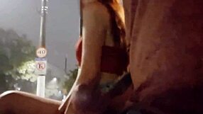 Risky handjob for brunette at the bus stop