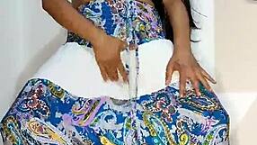 Colombian babe Bluee squirts on her skirt and pisses for you.